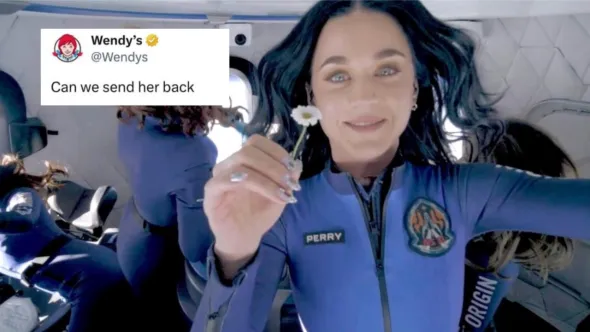 Katy Perry floats inside a Blue Origin capsule in a blue flight suit, smiling and holding a daisy. A Wendy’s tweet overlay reads, “Can we send her back.”
